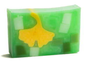 Green soap with embedded white and dark green squares and a yellow ginkgo leaf.