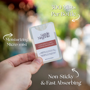 Coconut Cove Sanitizing Mist handheld spray bottle from Still Magnolia brand.
