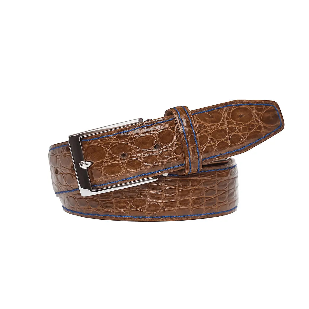 Luxury cognac crocodile belt showing handmade leather craftsmanship