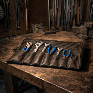 Leather tool roll with adjustable wrenches and pliers