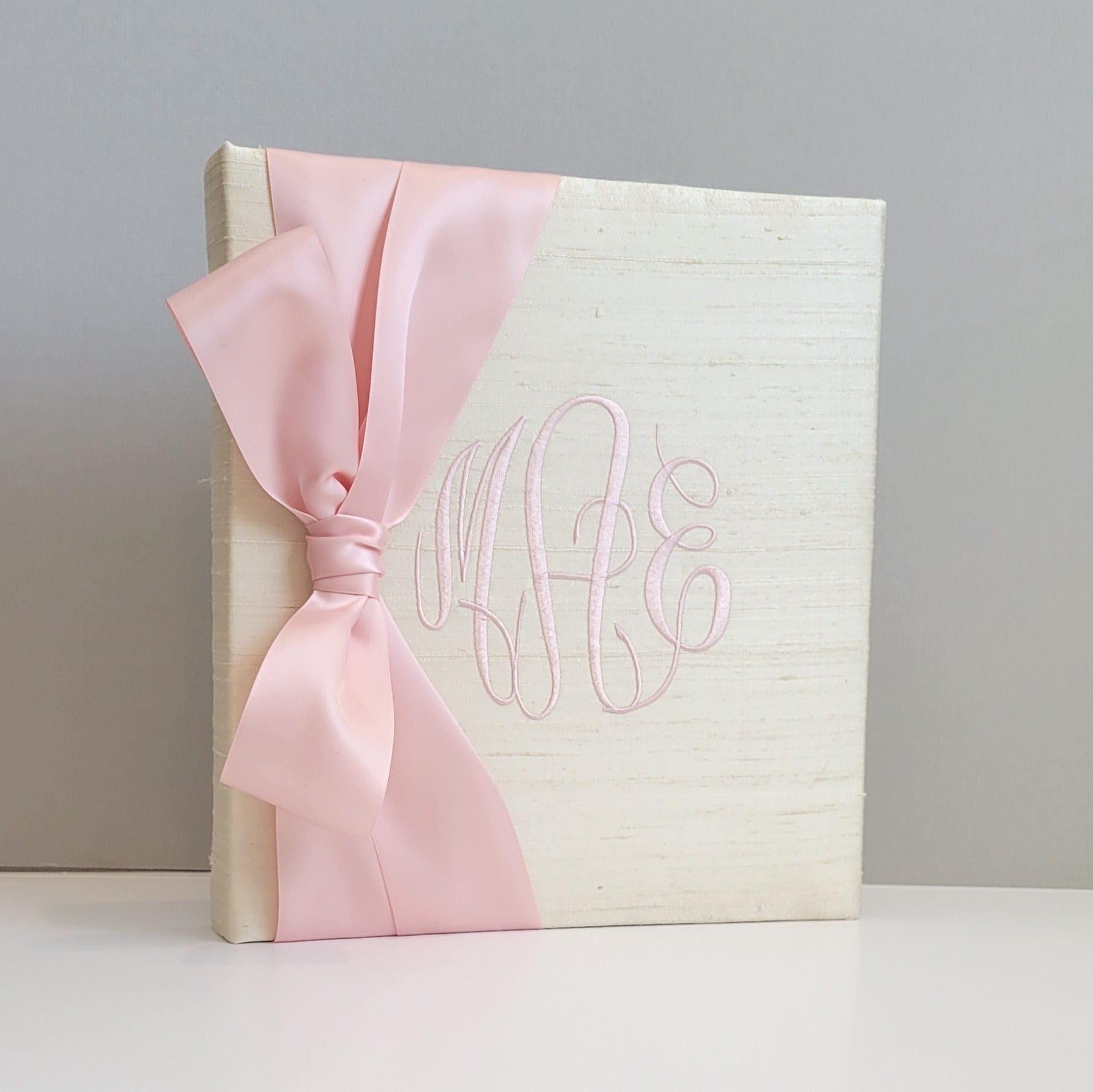 Cream silk handmade baby memory book with satin bow by AP Creations
