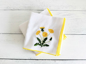 Dandelion embroidered white flour sack towels with yellow trim, set of two