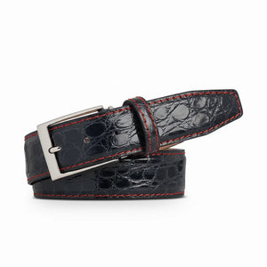 Close up of dark gray caiman crocodile leather texture