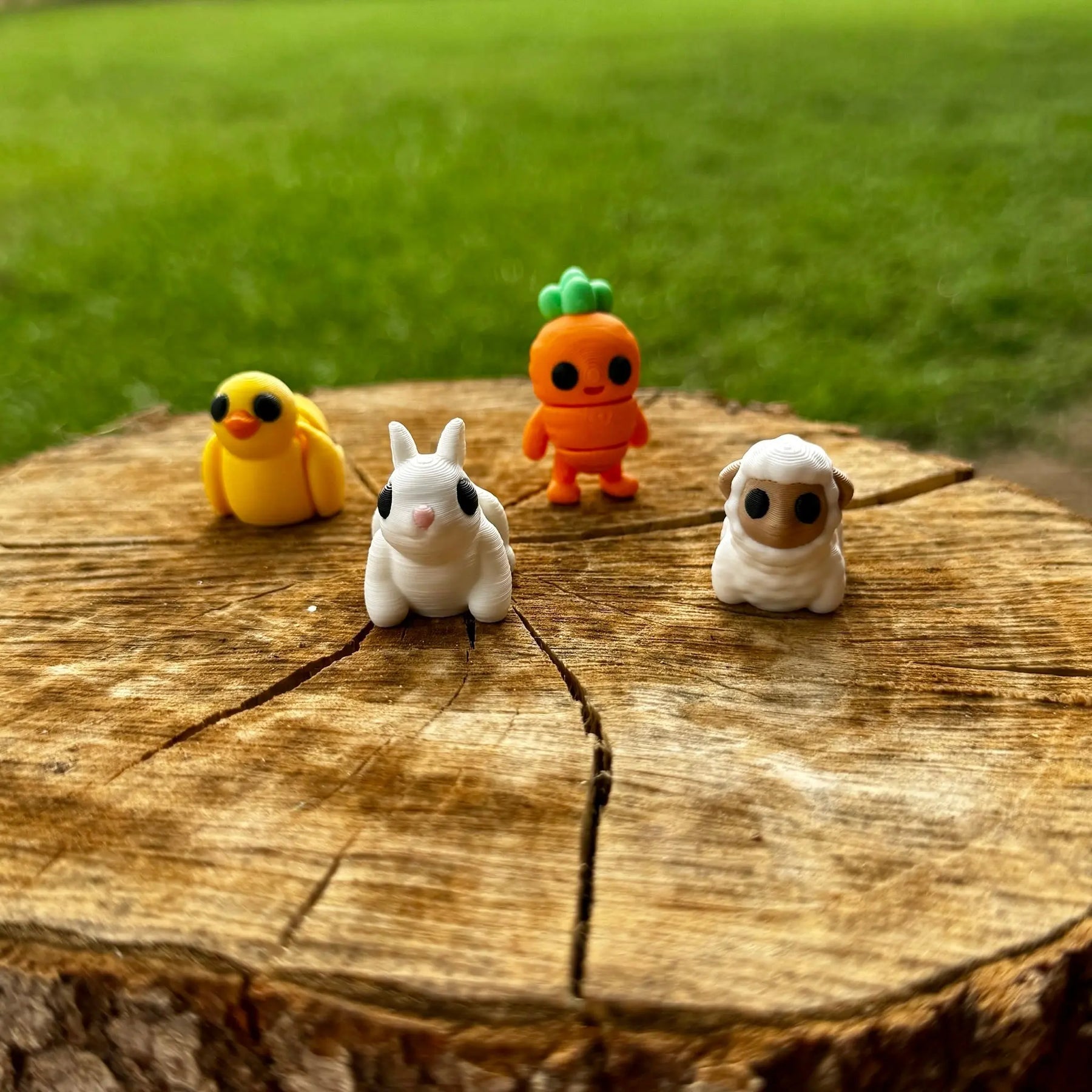 Easter Fidget Toys: Chick, Bunny, Carrot, Sheep on Wooden Stump. 3D Printed Miniatures from Main Street Collective.