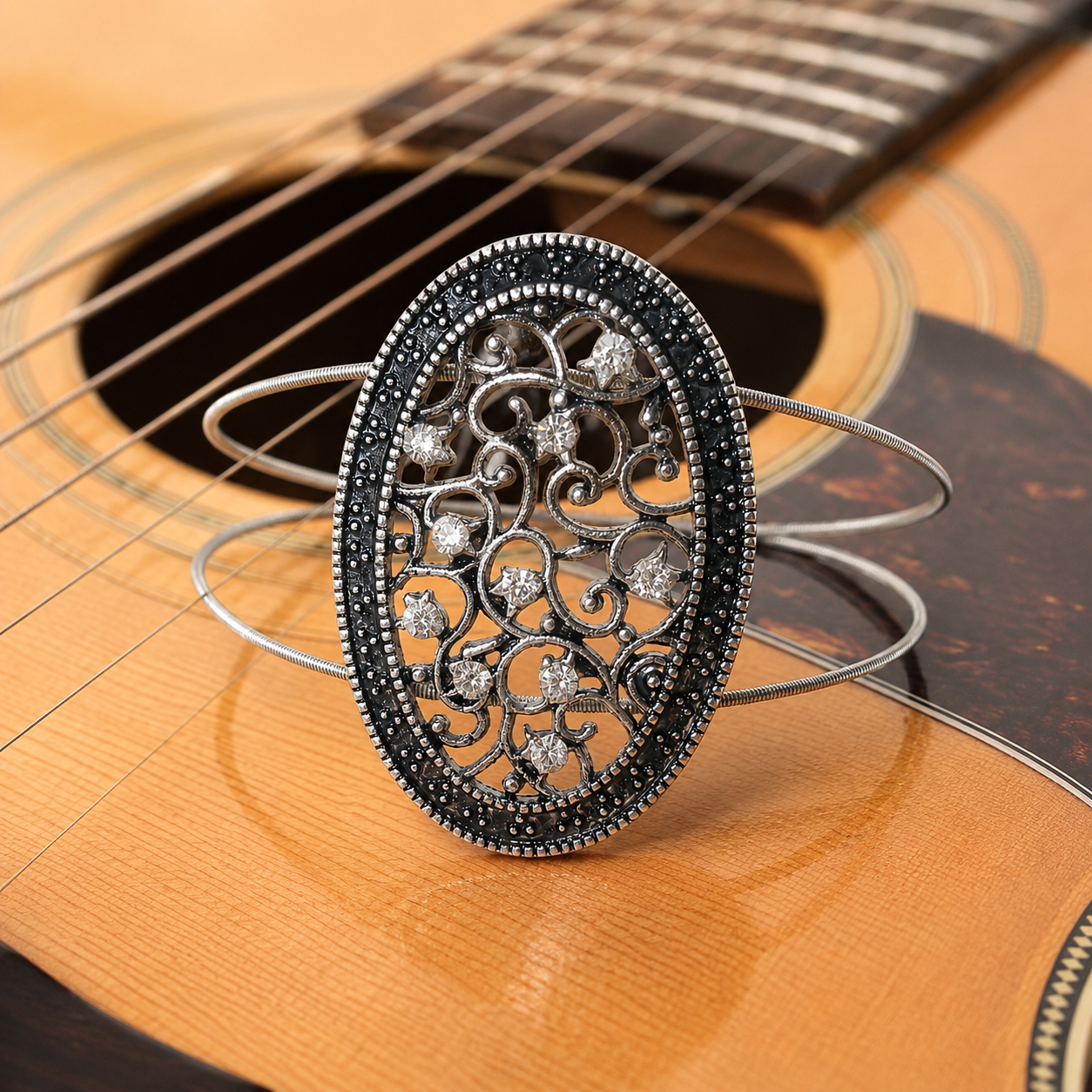 Silver filigree oval guitar string bracelet by N Harmony Jewelry