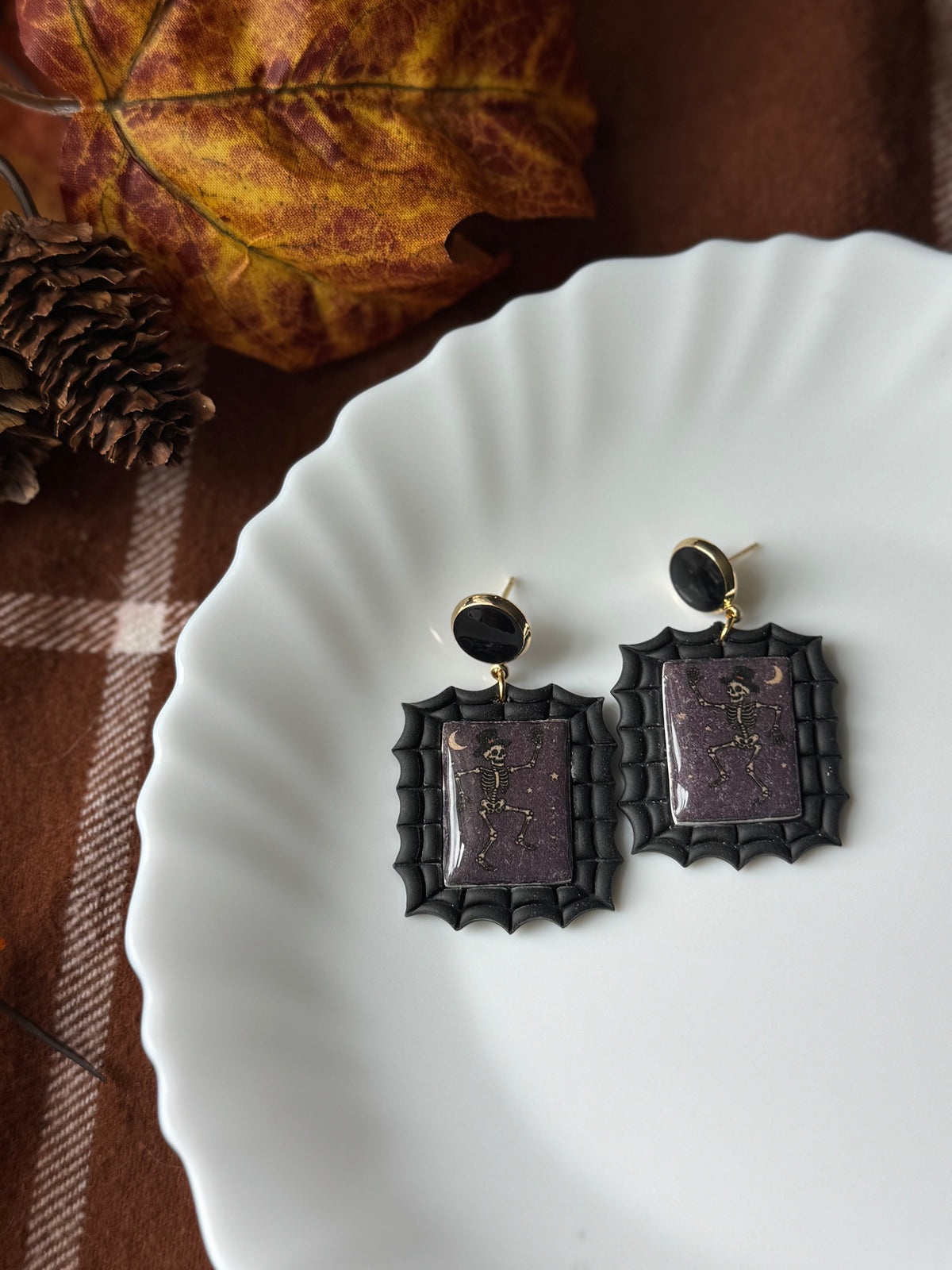 Dancing Skeleton Stamps handmade polymer clay earrings by Shop Something Earthy — view 1 of 2