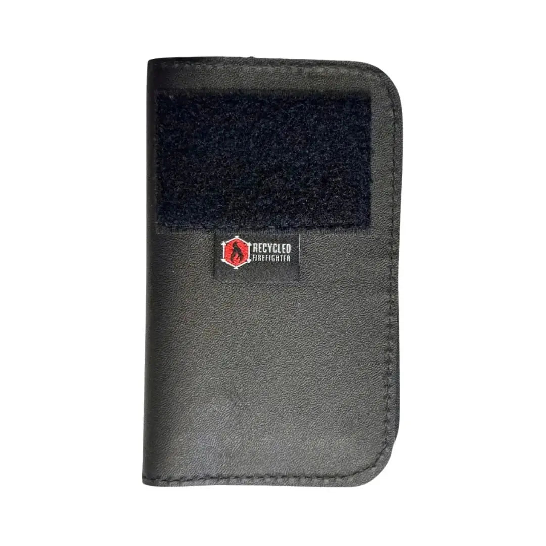 Black Field Notes wallet with a Recycled Firefighter logo and a black Velcro loop patch.