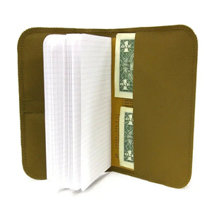 Brown leather-like wallet with open Field Notes notebook and dollar bills