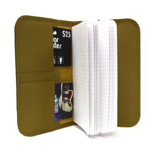 Brown leather-like wallet holding notebook and cards