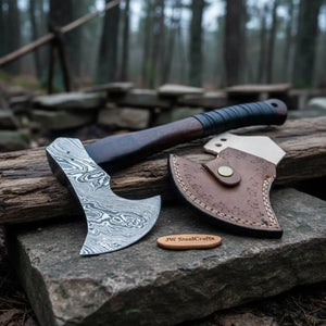 Damascus steel axe head with wood handle on rustic wood surface