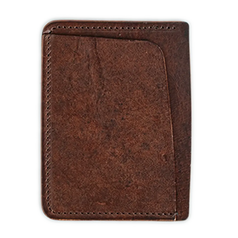 Cognac leather card wallet with visible stitching and a thumb cutout for easy card access from Main Street Collective.