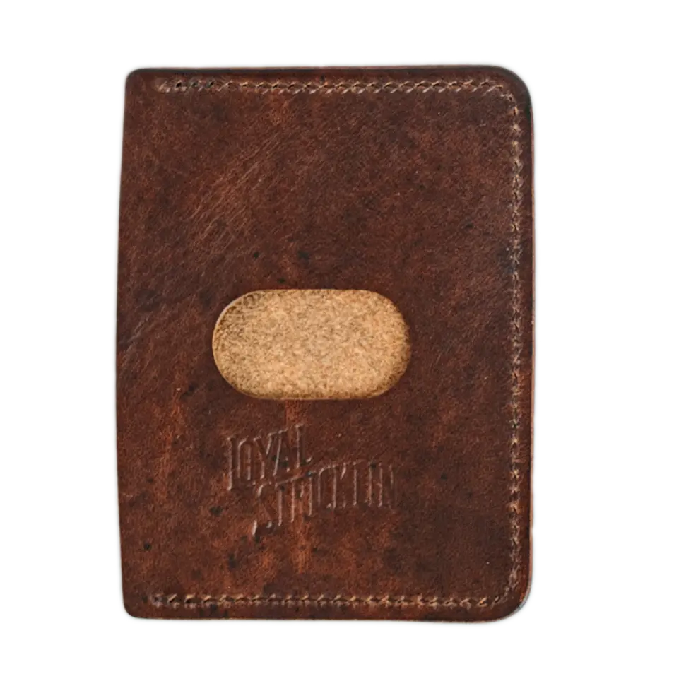 Cognac leather Frank wallet by JOYAL STICKLIN. Small, thin wallet with card pockets and thumb opening for easy card access.