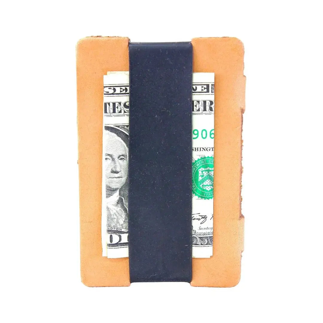Full grain leather card wallet with black silicone cash strap holding US dollar bills.