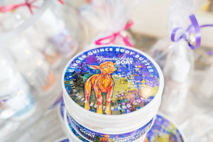 Appalachian Goat Ginger Quince Body Butter tubs with colorful goat illustration label.