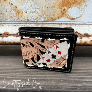 Gambler leather men's wallet with hand-tooled aces and stitching.