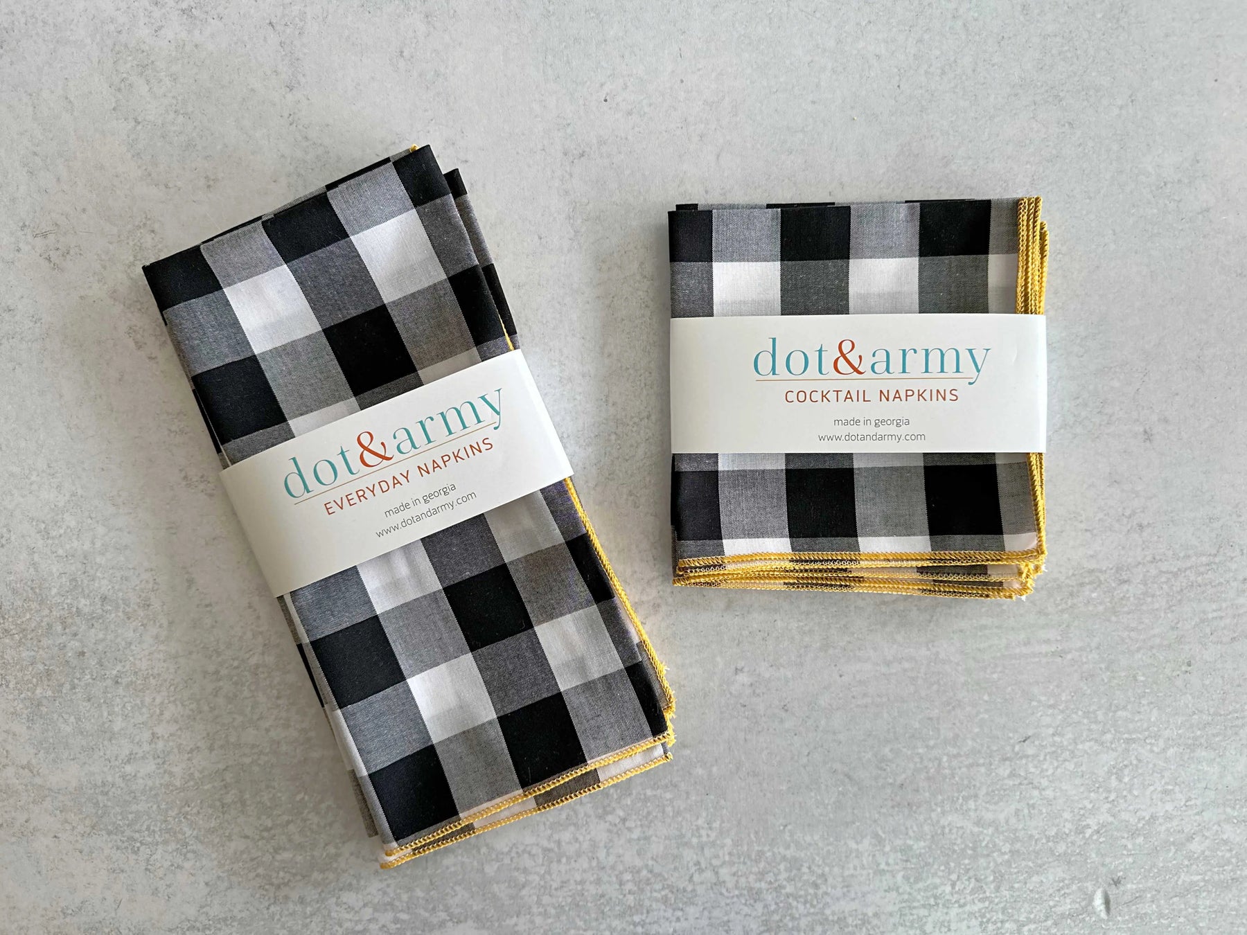 Black and white gingham cloth napkins with gold trim, Dot & Army branding