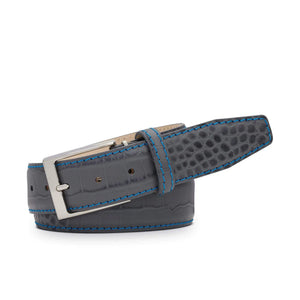 Close up of gray mock gator leather belt texture