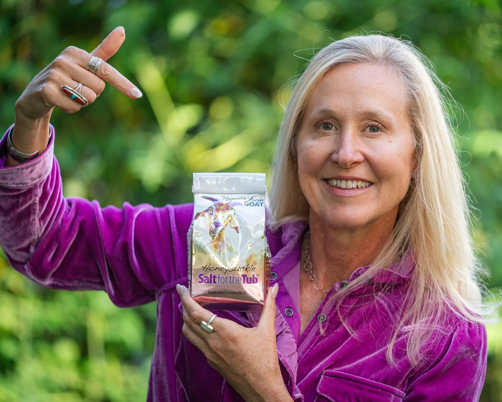 Woman holding Honeysuckle Salt for the Tub bath salts by The Appalachian GOAT
