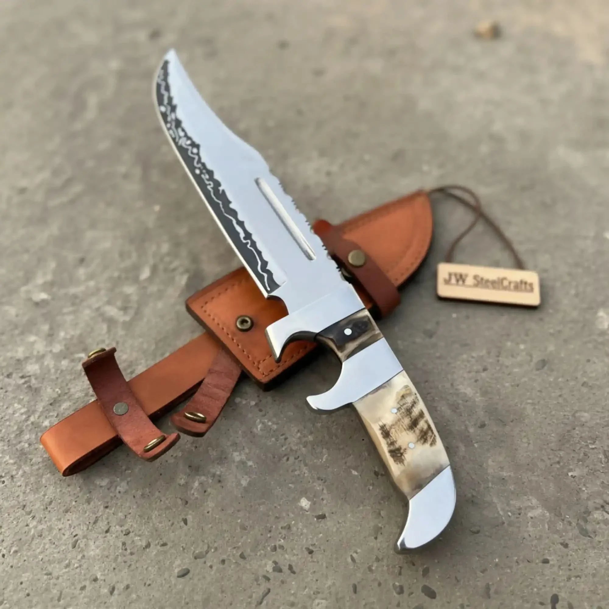 Handmade carbon steel steel knife with premium handle on dark surface