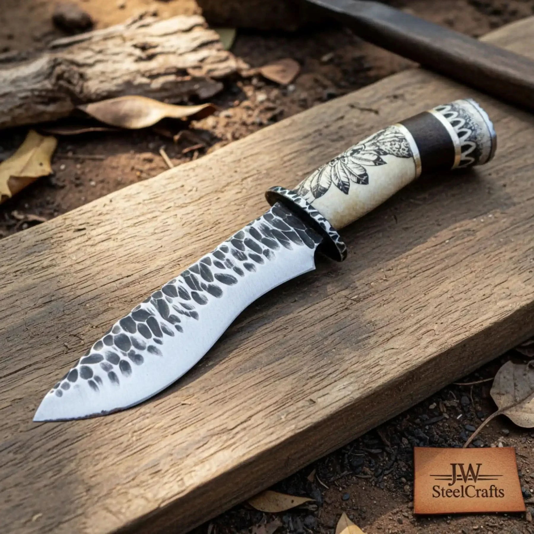Handmade carbon steel steel knife with premium handle on dark surface