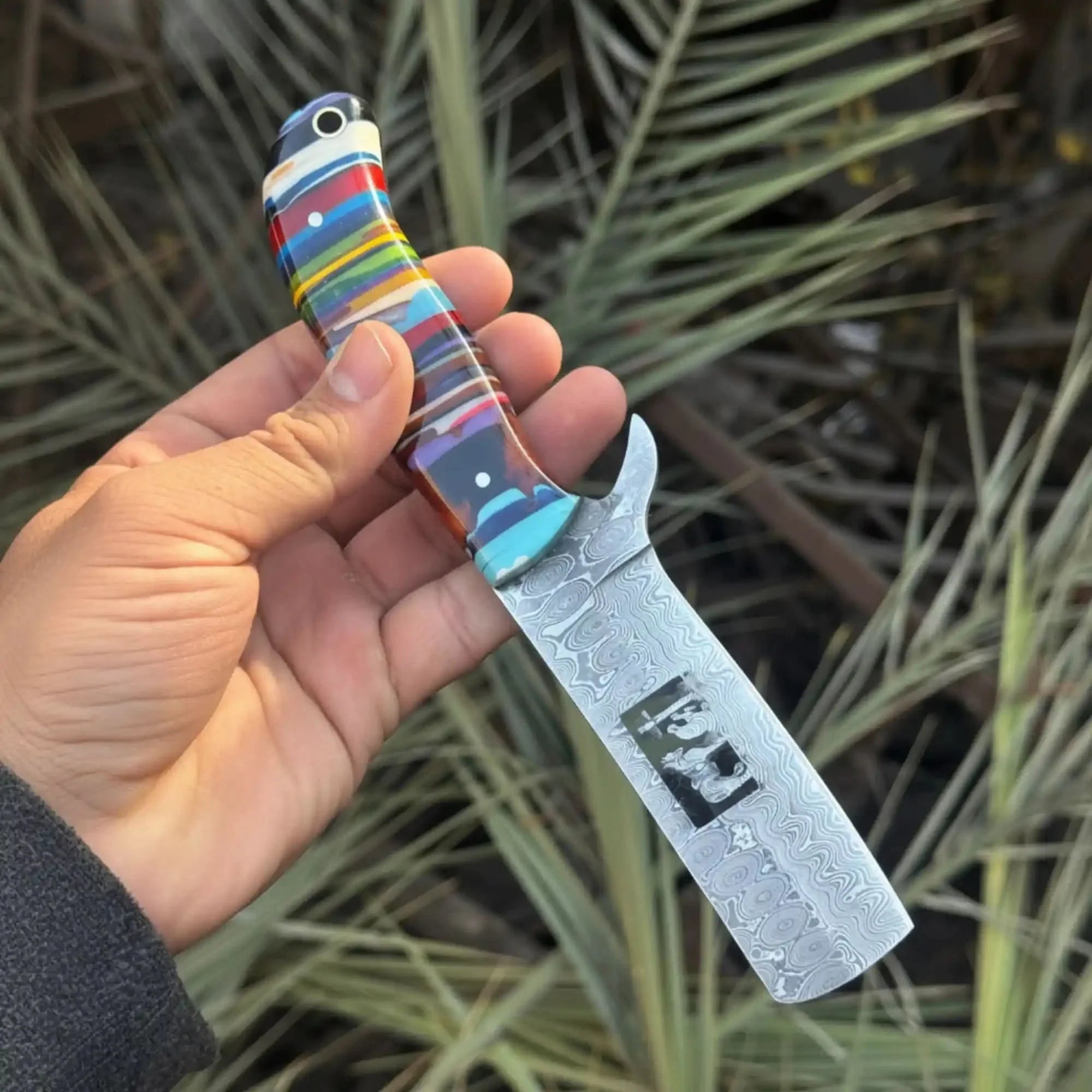 Damascus Bull Cutter Knife — Multi-Color Rainbow Resin Handle, Christian Cross Blade Engraving, Steel Bolster & Lanyard Hole by JW SteelCrafts