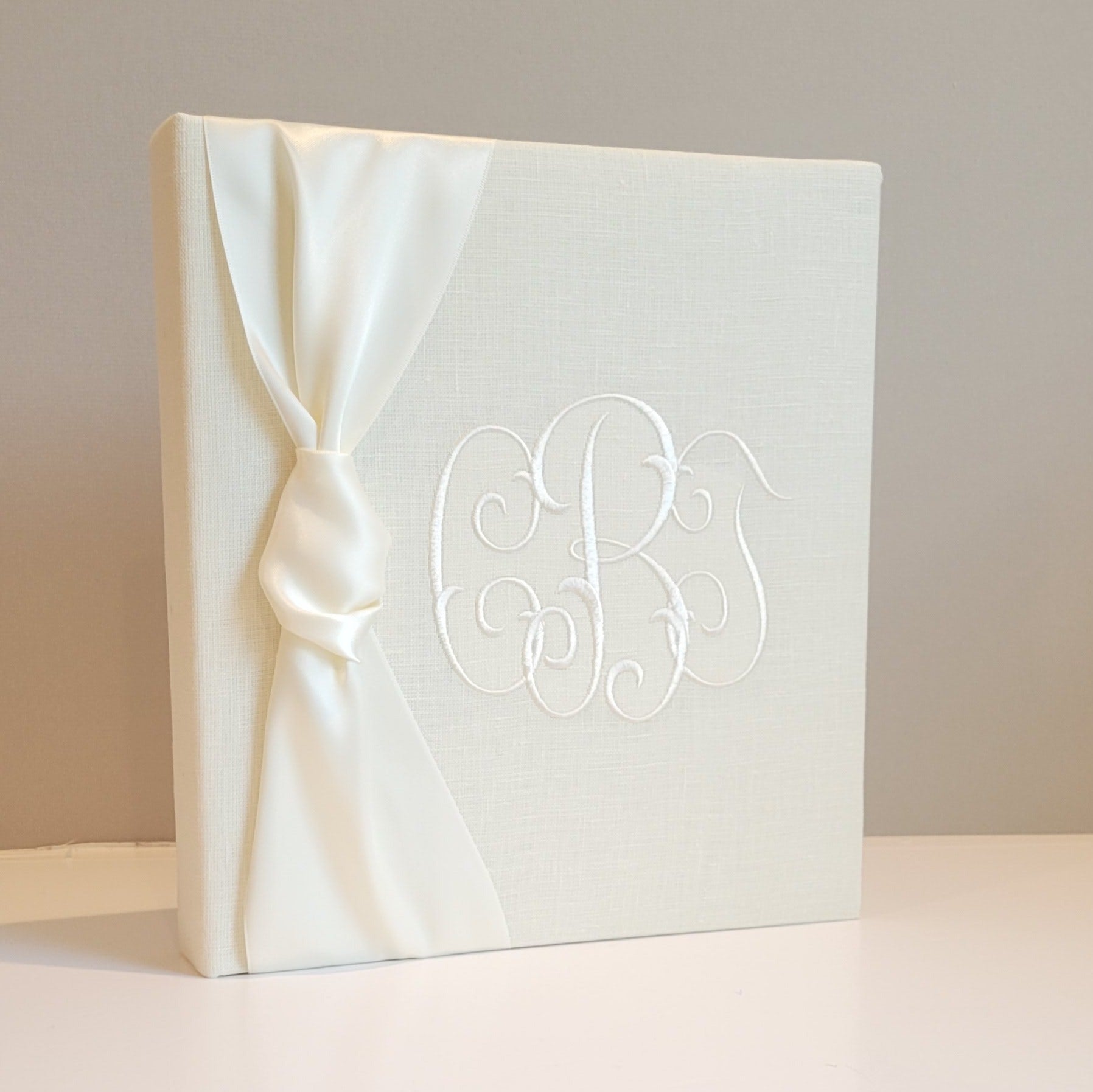 Ivory linen handmade baby memory book with satin bow by AP Creations