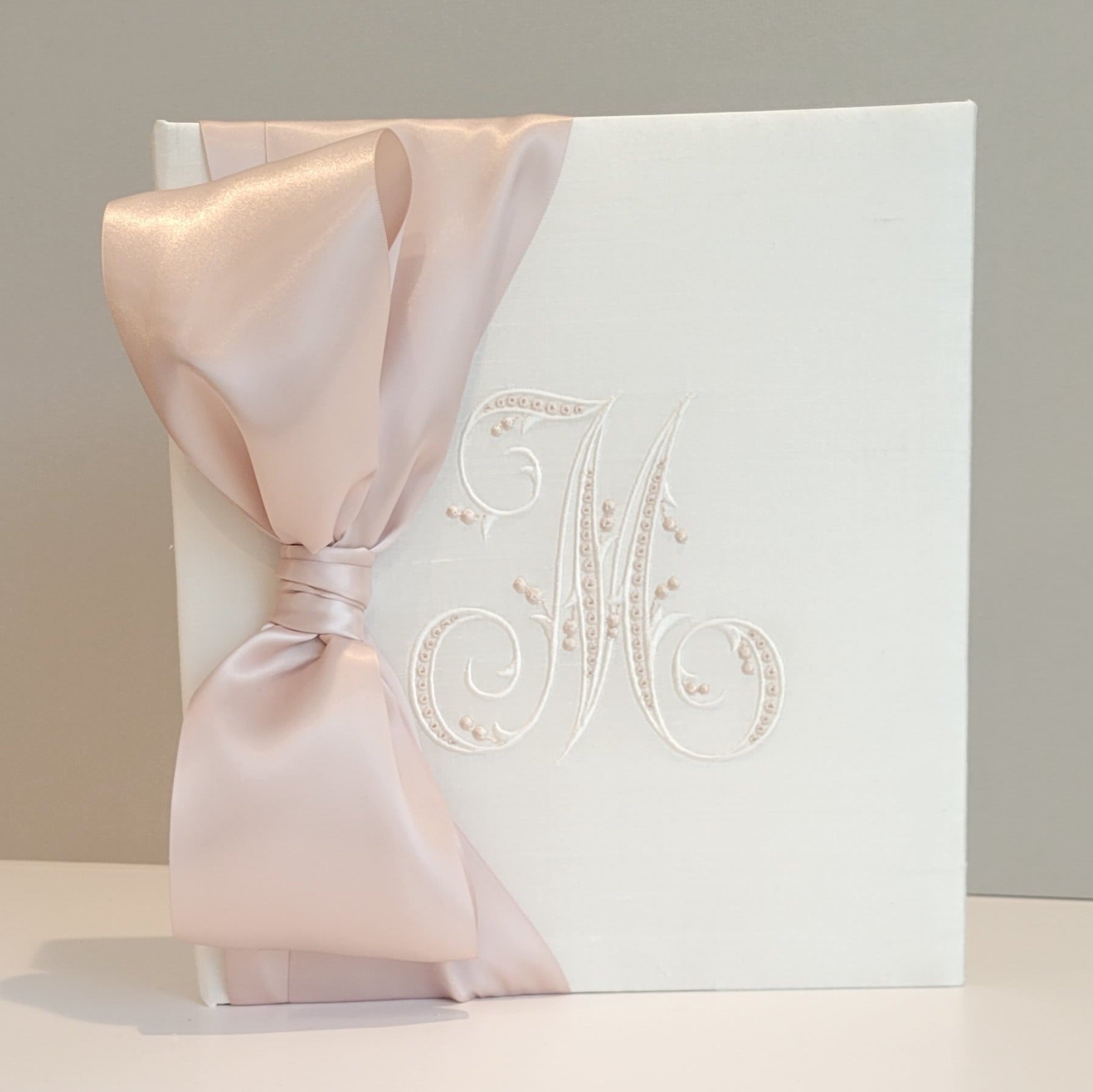 Ivory silk handmade baby memory book with satin bow by AP Creations