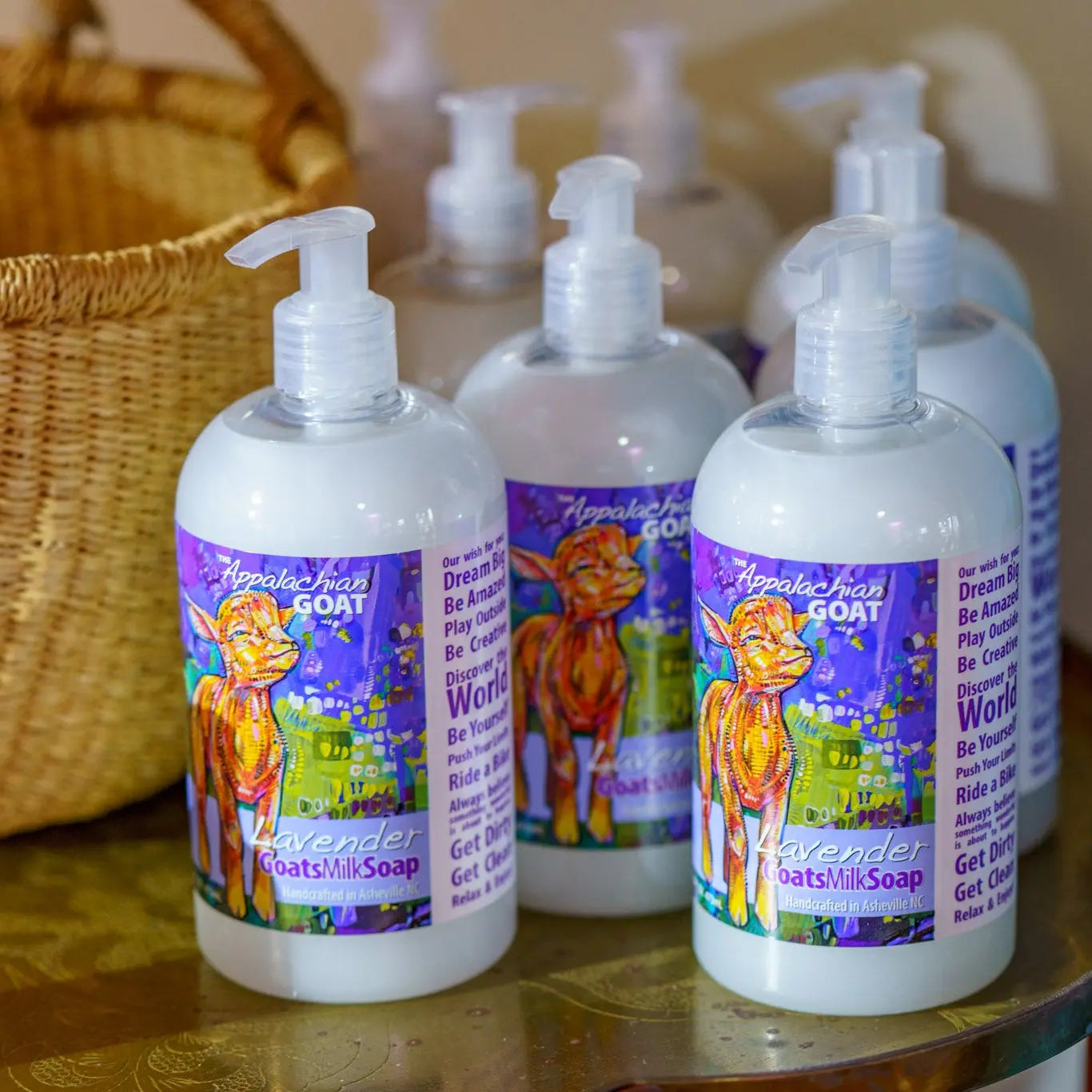 Lavender Goats Milk Liquid Soap bottles with pump tops displayed.