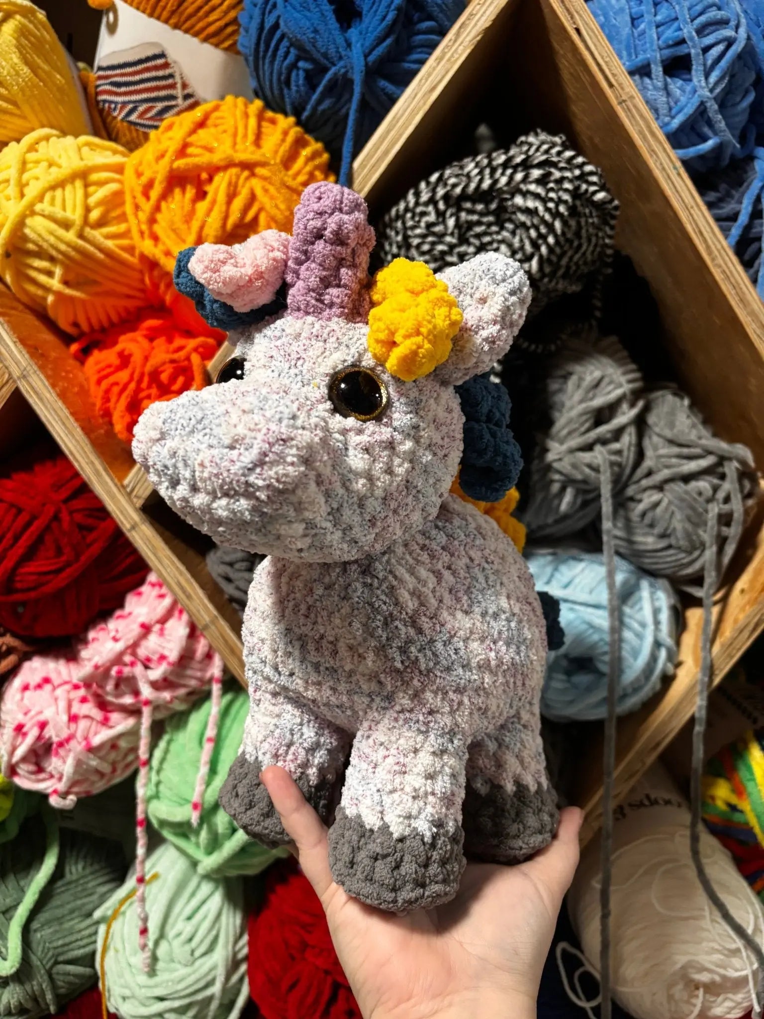 Handmade crocheted unicorn plush toy: Lucky the Unicorn from Main Street Collective. Soft, cuddly & colorful!