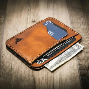 Brown leather minimalist wallet with cards and cash