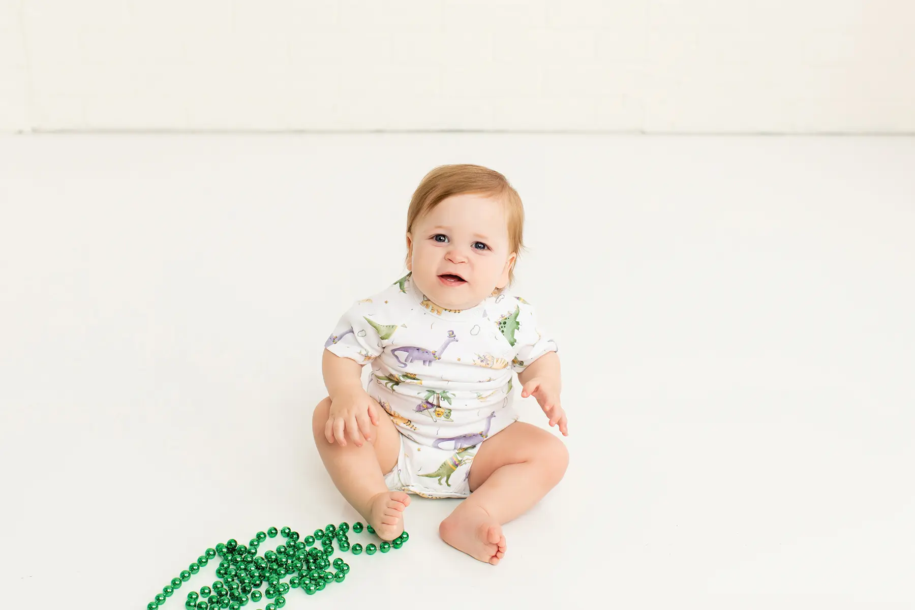 Mardi Gras-Saurus Organic Cotton Mardi Gras Onesie Nola Tawk