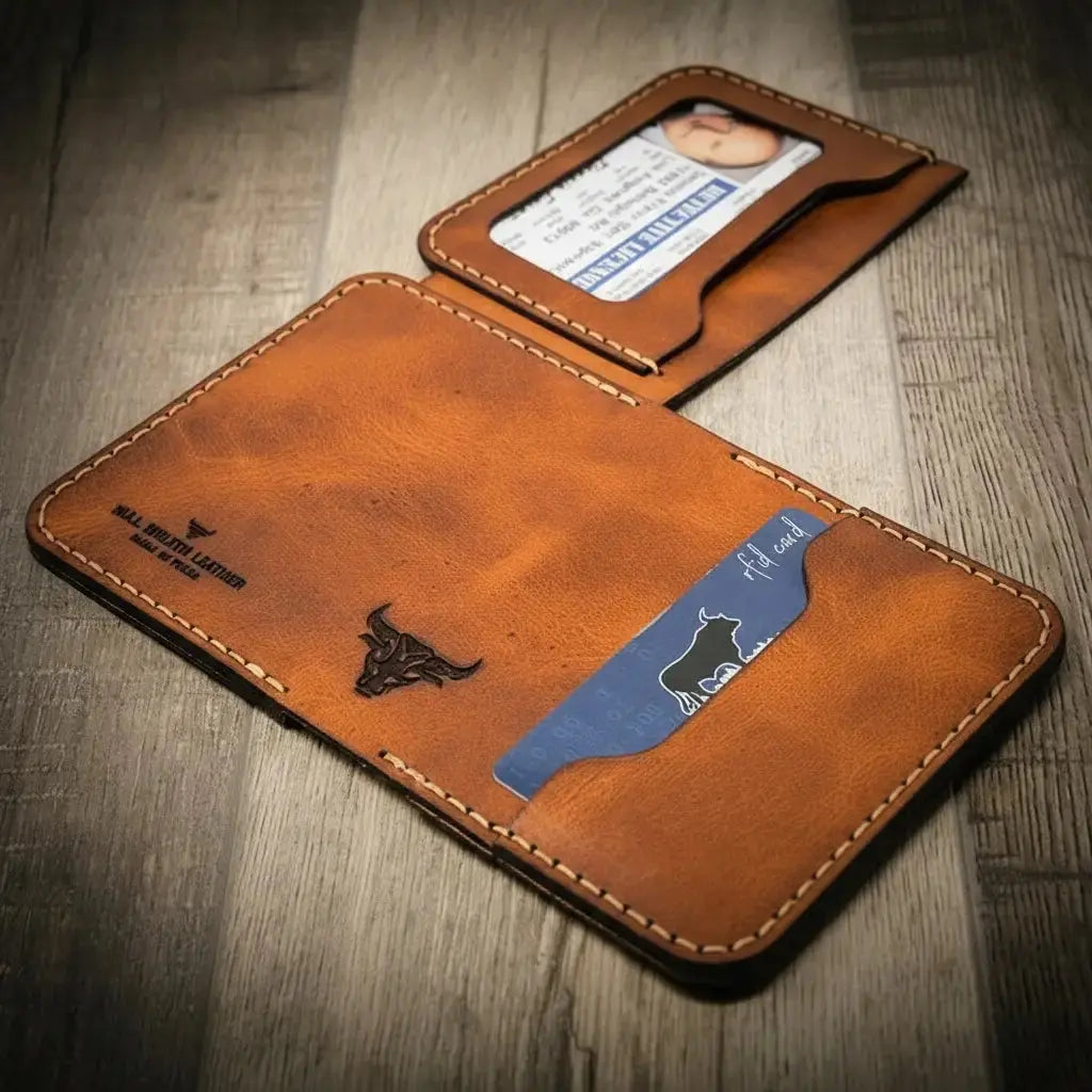 Brown leather minimalist wallet with bull emblem, card slot, and ID window