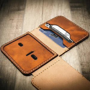 Brown leather minimalist badge wallet with card slots and ID window.