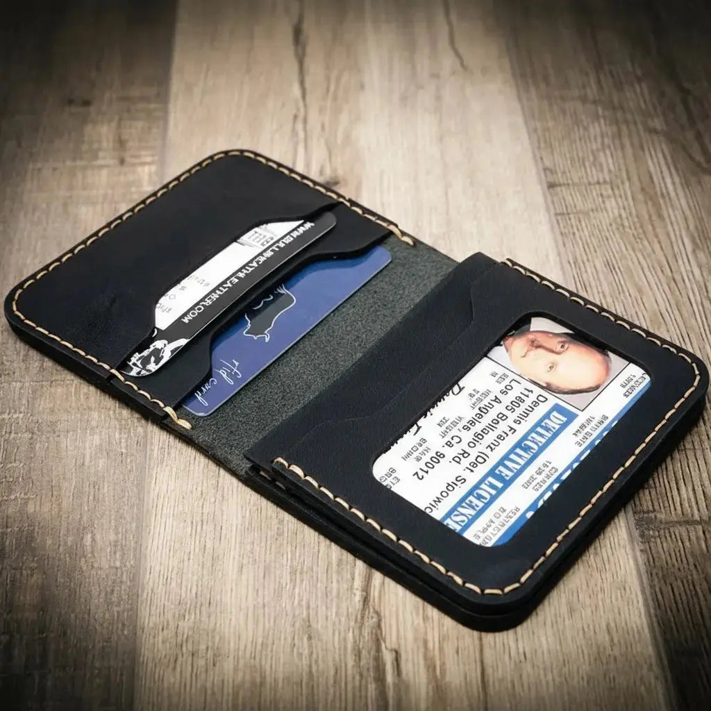Black leather minimalist badge wallet with driver's license and cards