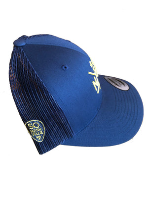Navy blue mesh trucker snapback hat with yellow NSH X Hockey Sticks and So Nashville logos.
