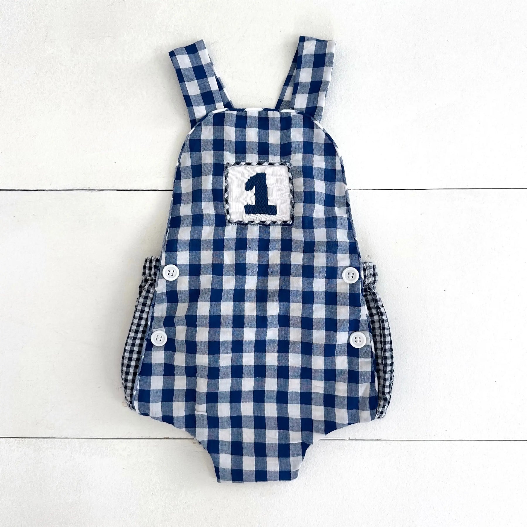 Navy Blue Smocked First Birthday Sunsuit Seven Lantern Lane