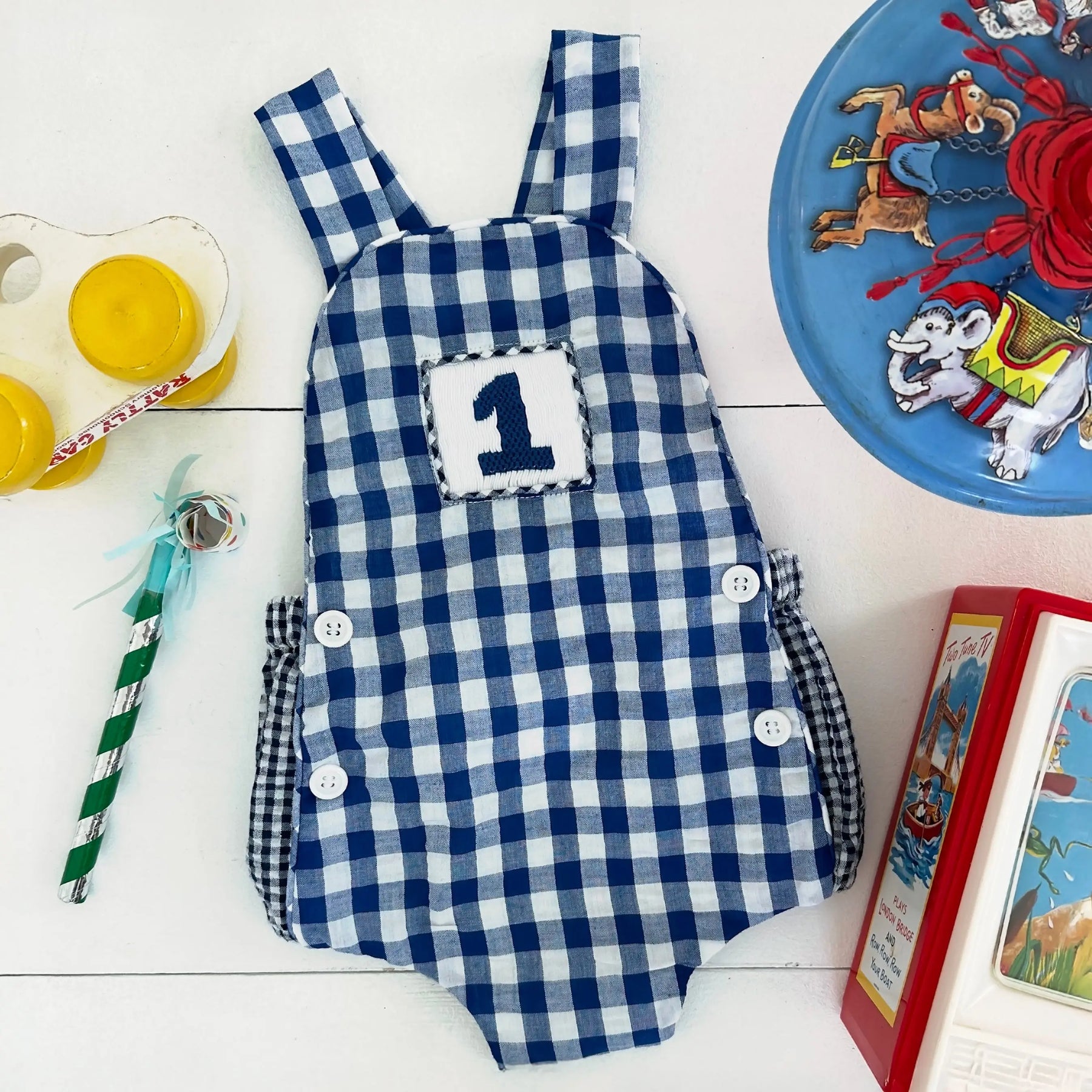 Navy Blue Smocked First Birthday Sunsuit Seven Lantern Lane