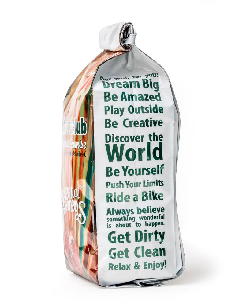 Bag of Pomegranate Sunrise bath salts with "Our wish for you" text.