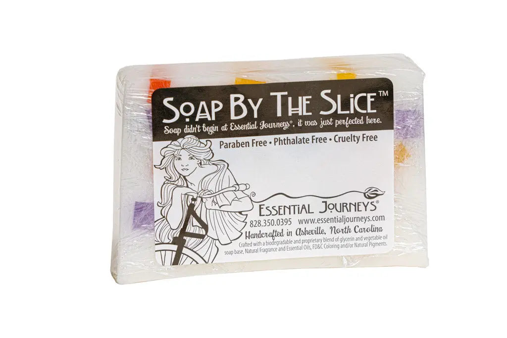 Essential Journeys Soap By The Slice bar with colorful layers, shrink-wrapped.