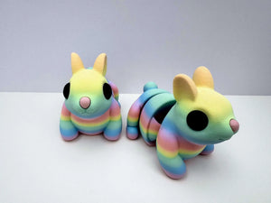 Pastel Rainbow Bunny Fidget Toys - Multiple, 3D Printed Sensory Toys. Mushroom Lady Co. Articulates and moves.