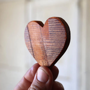 Wooden heart made from reclaimed piano soundboard.