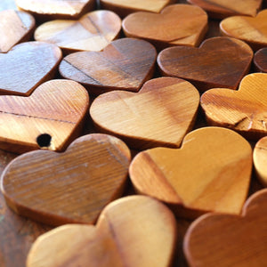 Wooden heart decorations made from reclaimed piano soundboards