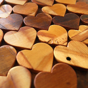 Wooden hearts made from reclaimed piano soundboards
