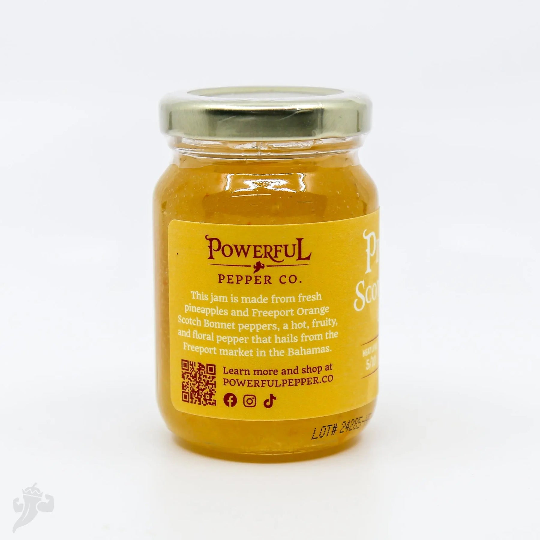Jar of Powerful Pepper Co. Pineapple Scotch Bonnet Chili Jam with label and ingredients.