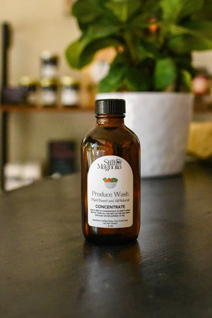 Still Magnolia Produce Wash concentrate bottle, 4 oz size.