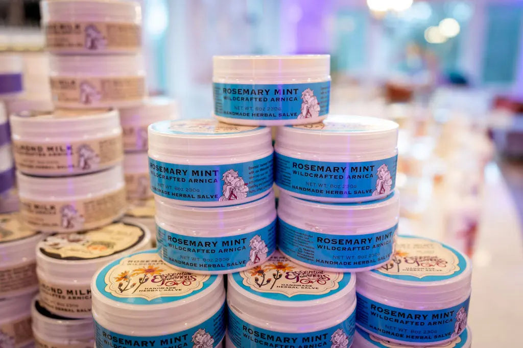 Stack of Rosemary Mint Arnica herbal salve jars