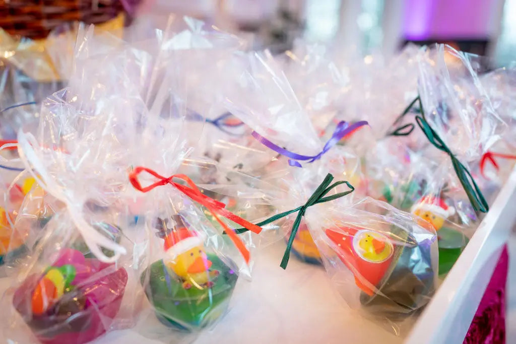 Wrapped rubber duck soaps with colorful ribbons