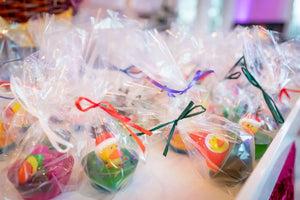 Wrapped rubber duck soaps with colorful ribbons