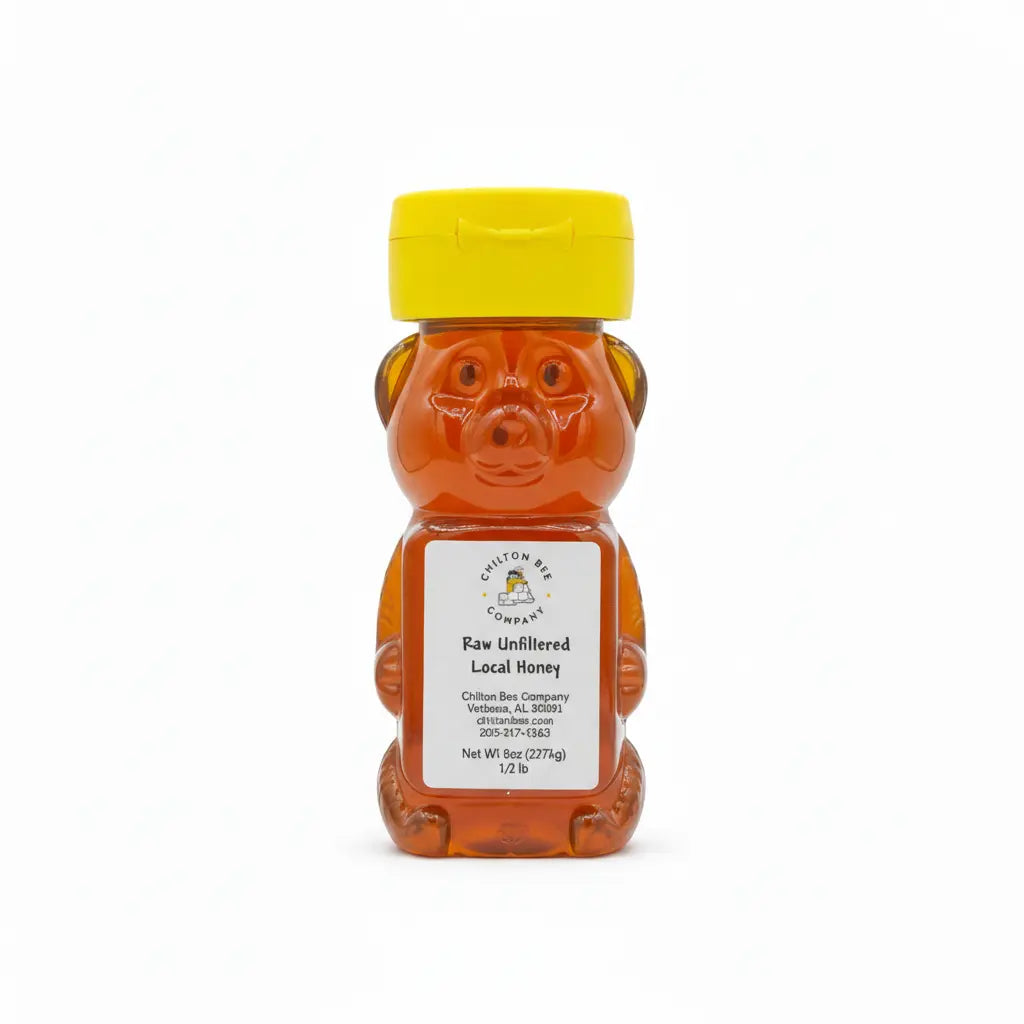Honey bear bottle filled with unfiltered honey, with yellow cap and "Chilton Bee Company" label.