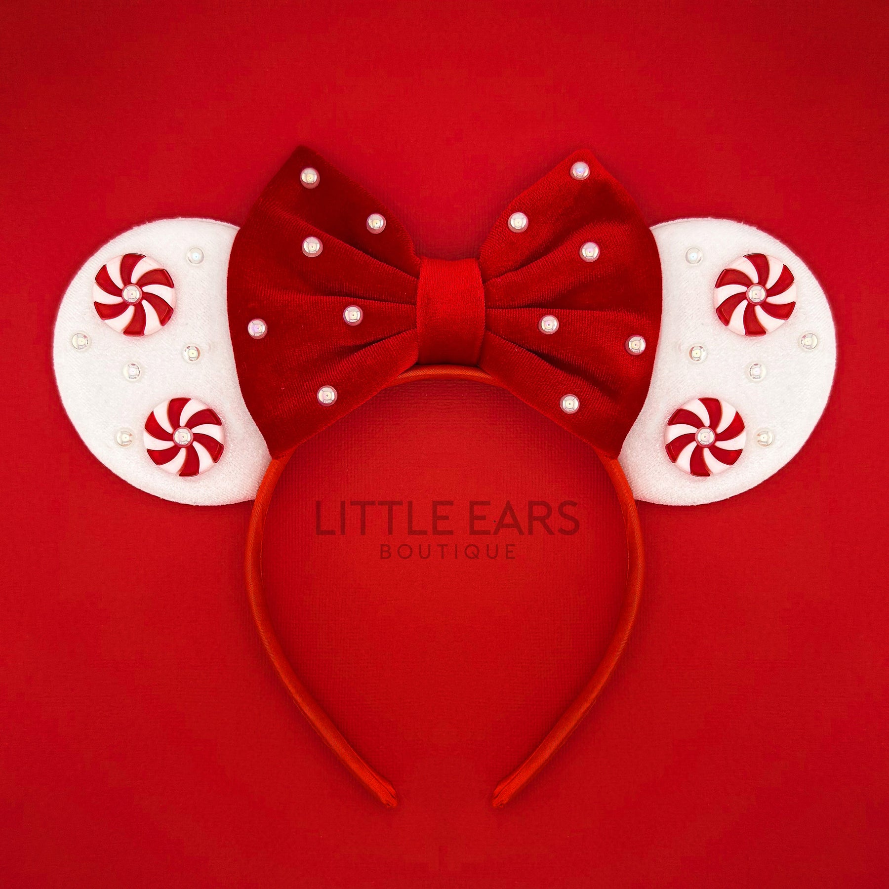 Red Velvet Christmas Ears by Little Ears Boutique, travel planning service main product photo